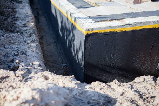 Professional Waterproofing technician working in Smithfield, VA